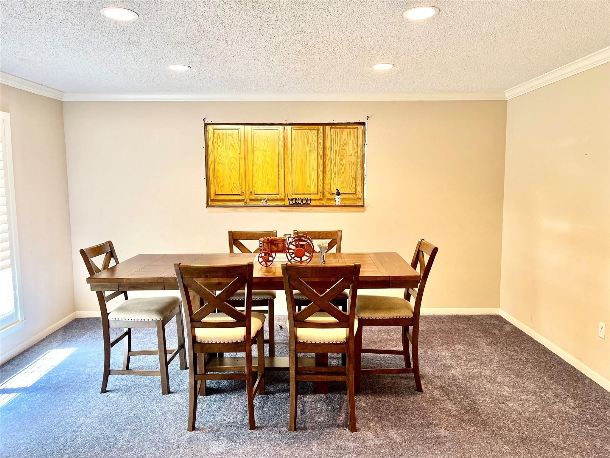 710 South Main Street Coolidge, TX 76635 - Photo 18 of 36 a view of a dining room with furniture and a window