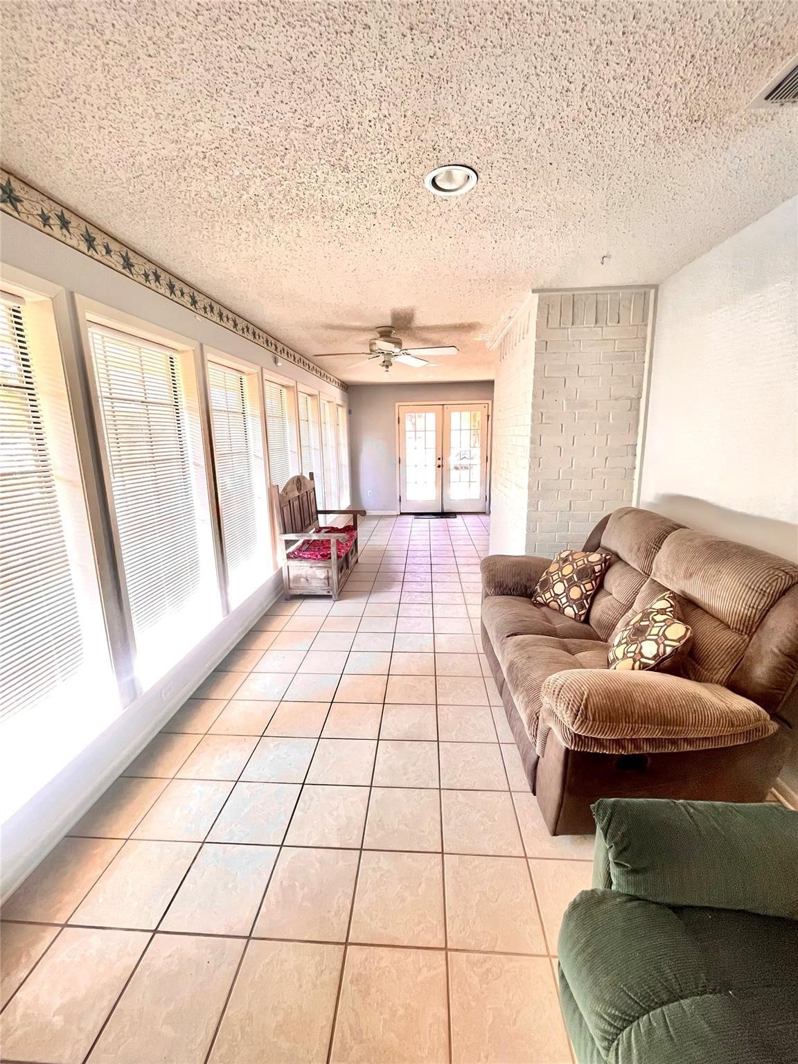 710 South Main Street Coolidge, TX 76635 - Photo 20 of 36 a living room with furniture and a large window