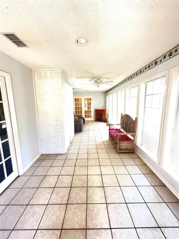 a bathroom with a sink mirror vanity and bathtub