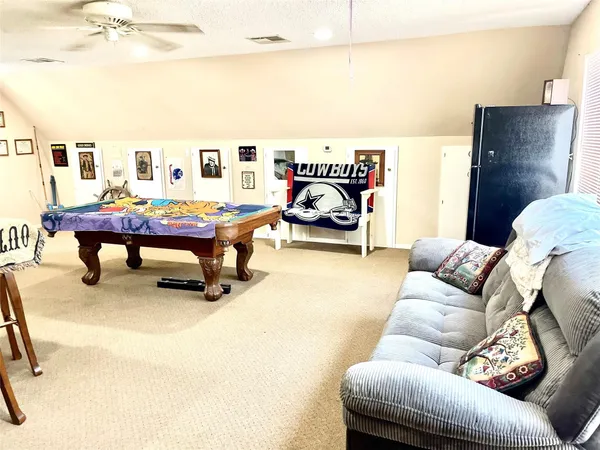 a living room with furniture and a couch