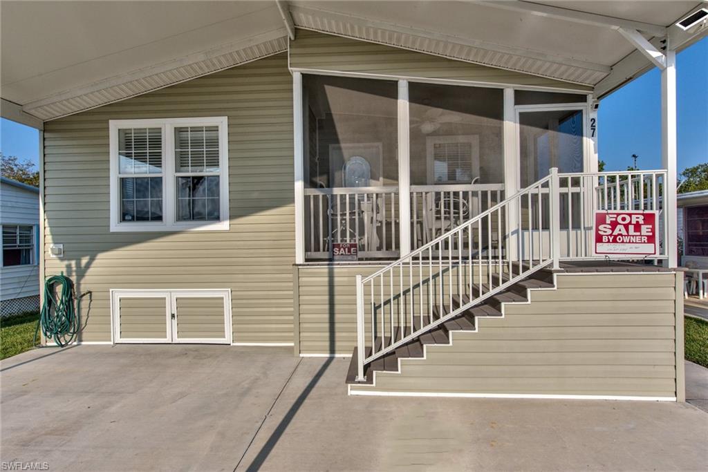 777 Walkerbilt Road, Unit 27 Naples, FL 34110 - Photo 4 of 31 a view of a balcony with stairs