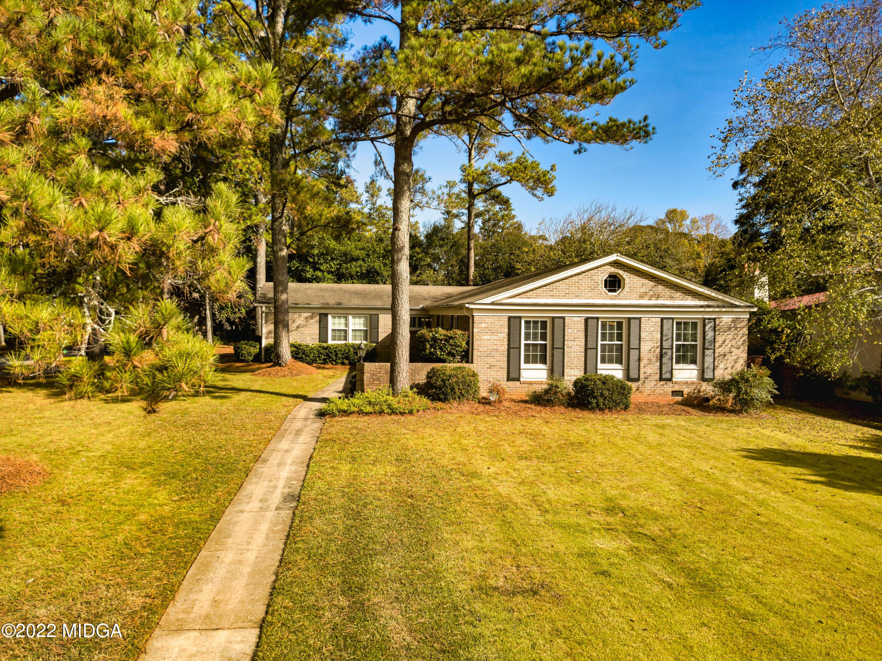 201 Larcom Lane Griffin, GA 30224 - Photo 2 of 64 a front view of a house with swimming pool
