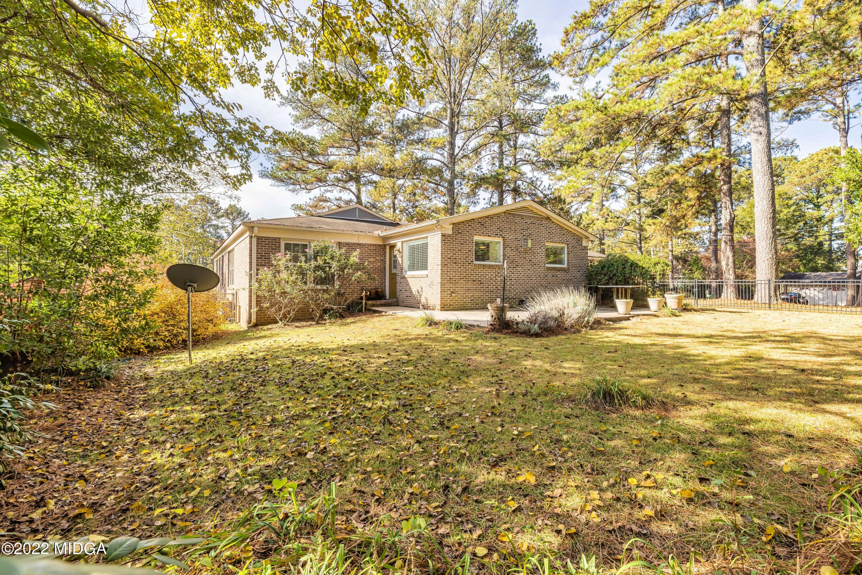201 Larcom Lane Griffin, GA 30224 - Photo 49 of 64 a front view of a house with a yard