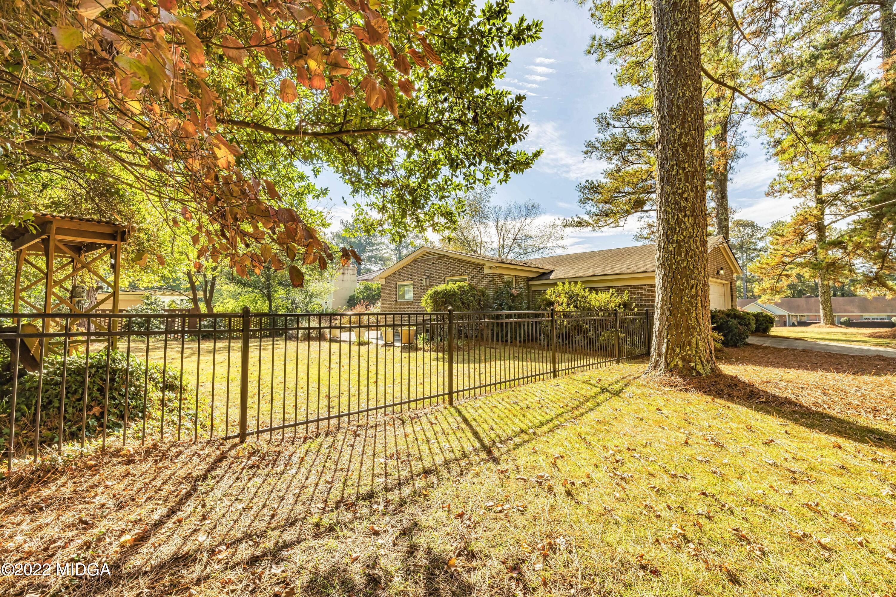 201 Larcom Lane Griffin, GA 30224 - Photo 52 of 64 a view of a swimming pool with an outdoor space and seating area