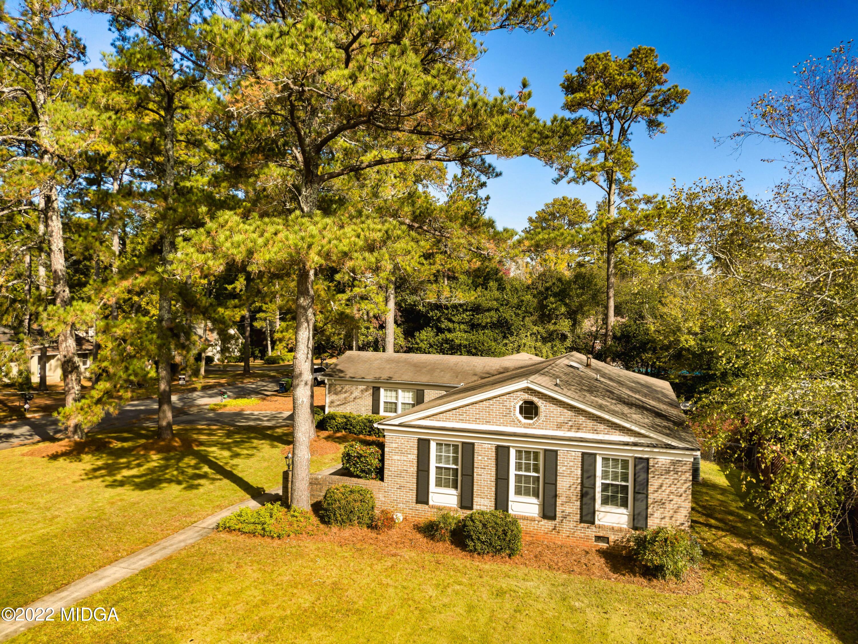 201 Larcom Lane Griffin, GA 30224 - Photo 54 of 64 a front view of a house with a yard