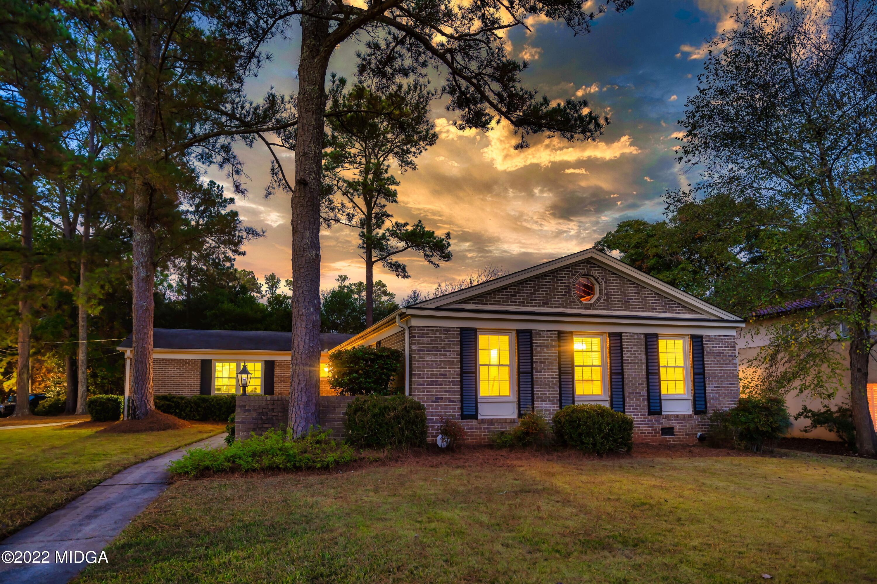 201 Larcom Lane Griffin, GA 30224 - Photo 61 of 64 a front view of a house with a yard
