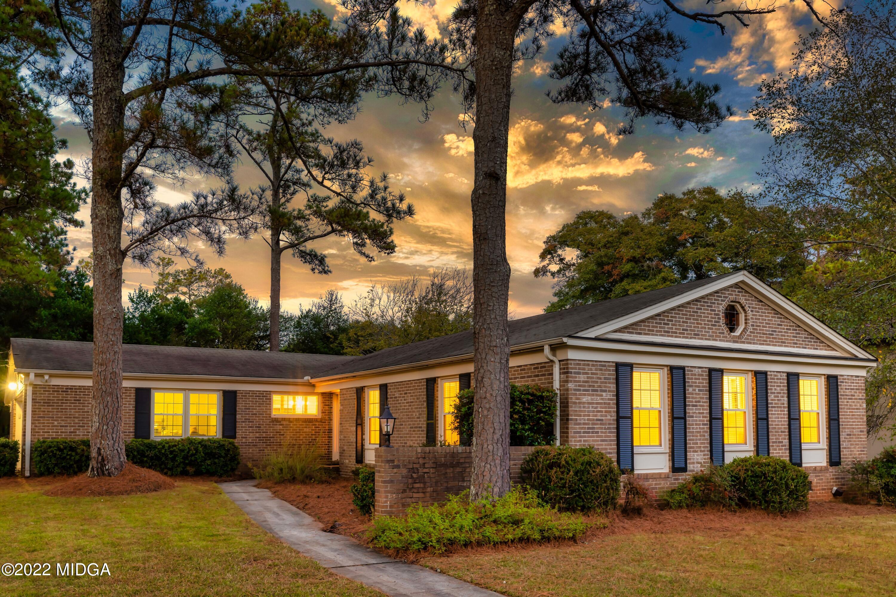 201 Larcom Lane Griffin, GA 30224 - Photo 62 of 64 a front view of a house with a yard