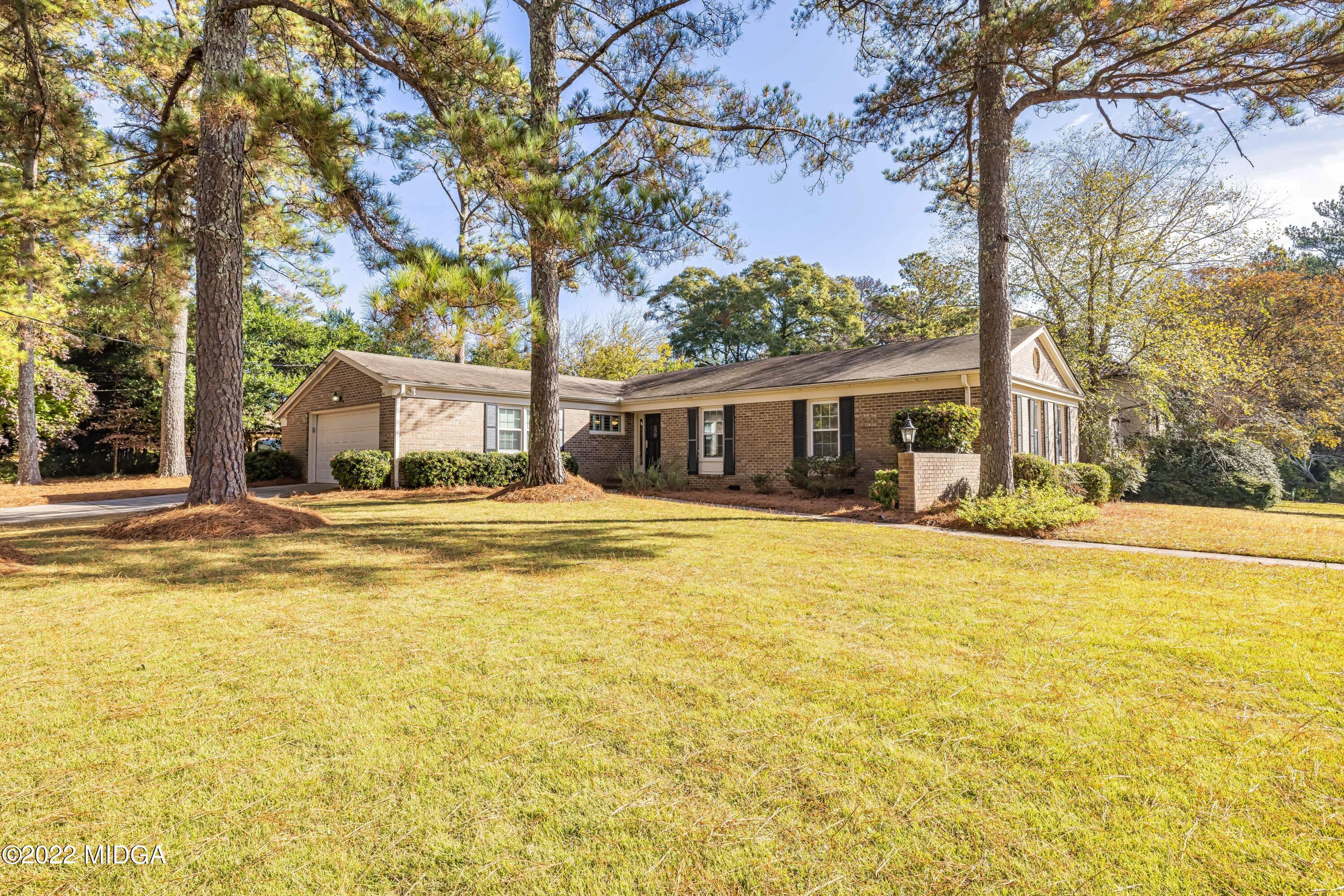 201 Larcom Lane Griffin, GA 30224 - Photo 9 of 64 a house view with swimming pool in front of house