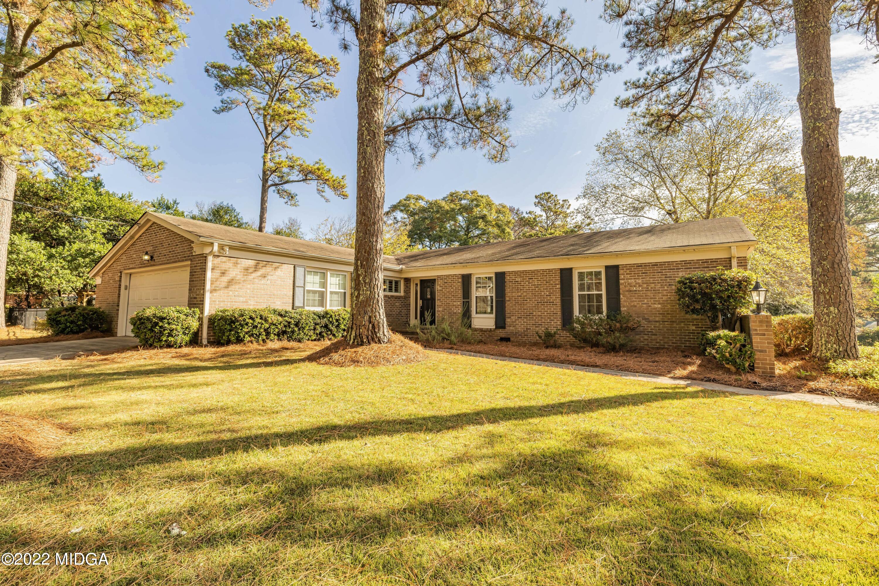 201 Larcom Lane Griffin, GA 30224 - Photo 10 of 64 a view of a house with a patio
