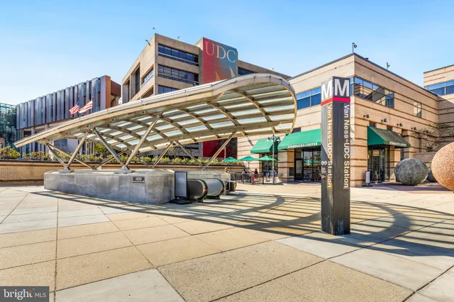 a street sign on the side of a building