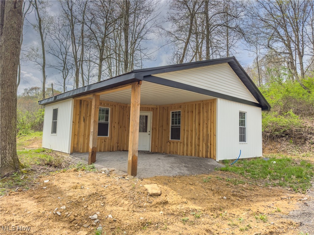 0 Bower Road Scio, OH 43988 - Photo 3 of 42 View of outdoor structure with driveway and an attached carport