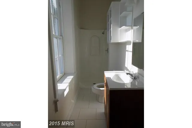 a bathroom with a sink and a toilet