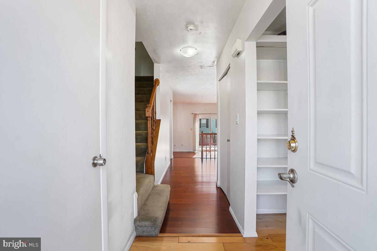 35 Bellfalls Way Nottingham, MD 21236 - Photo 2 of 30 a hallway with wooden floor closet and windows