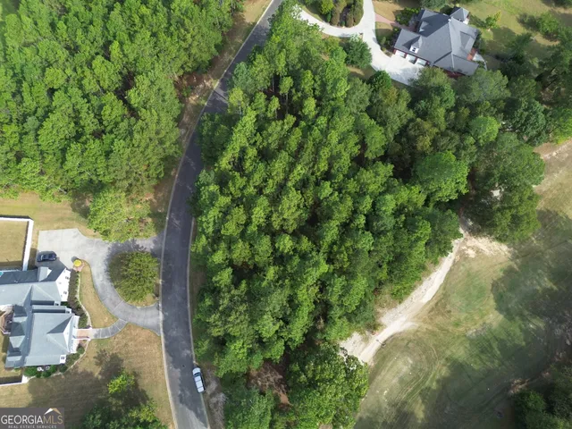 a view of a garden from a balcony