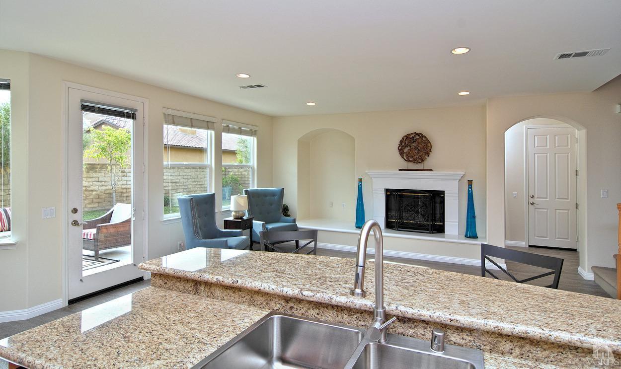 3522 Bridgehampton Way Camarillo, CA 93012 - Photo 12 of 52 a living room with fireplace furniture and a window