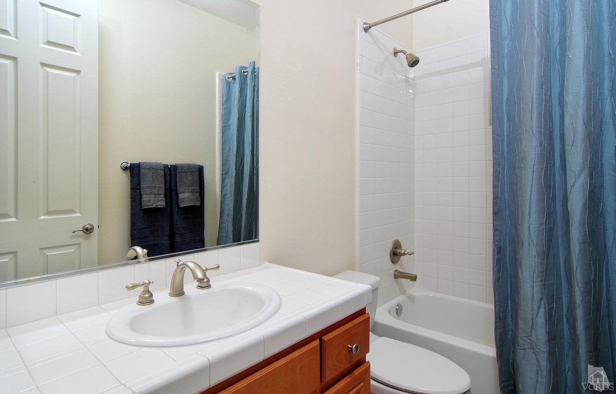 3522 Bridgehampton Way Camarillo, CA 93012 - Photo 18 of 52 a bathroom with a sink toilet and shower