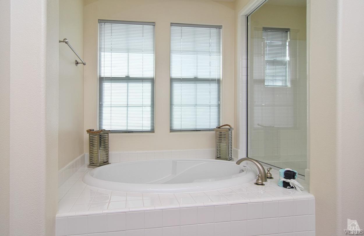 3522 Bridgehampton Way Camarillo, CA 93012 - Photo 24 of 52 a bathroom with a bathtub and a shower