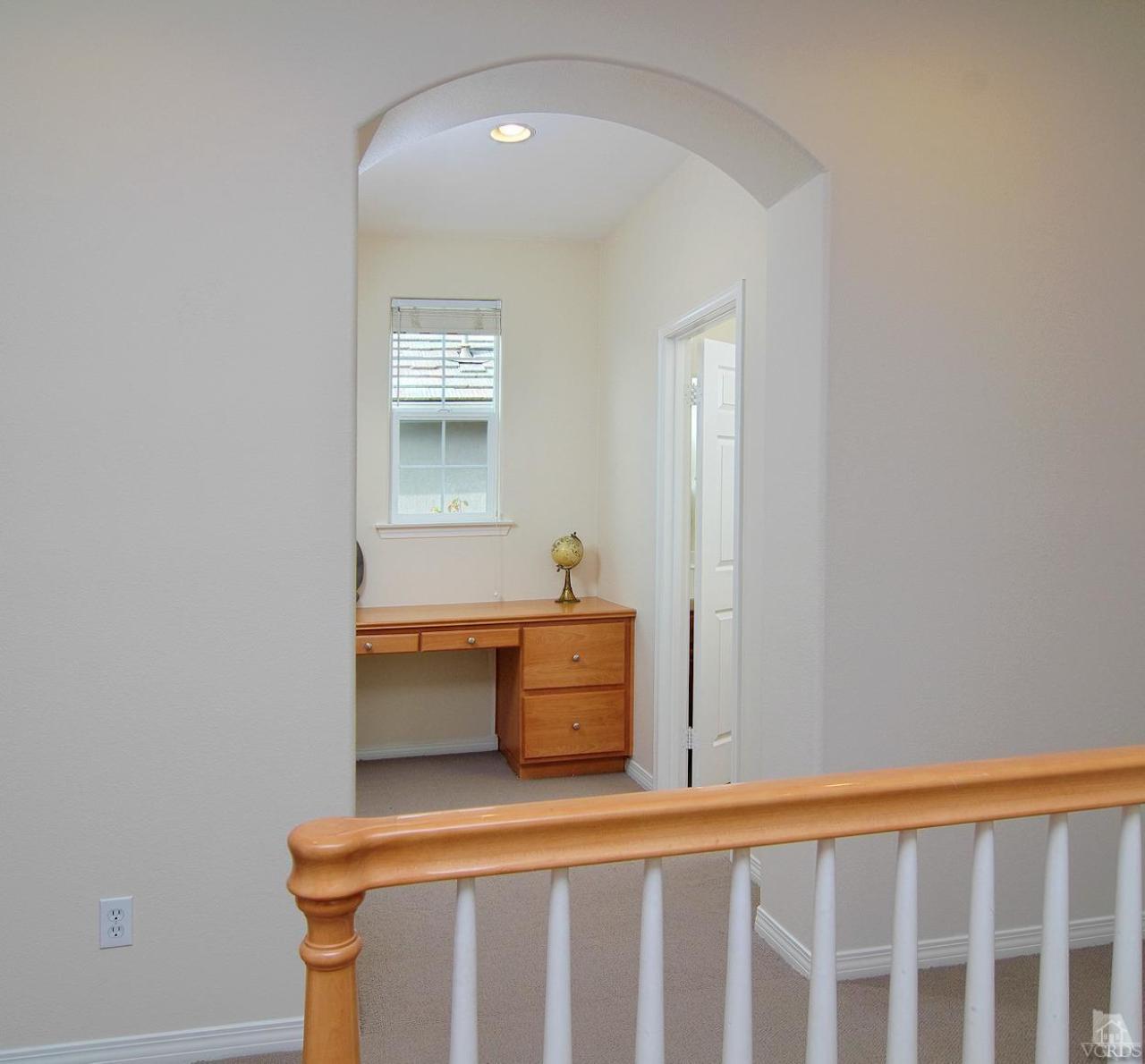 3522 Bridgehampton Way Camarillo, CA 93012 - Photo 32 of 52 a room with a table and a window