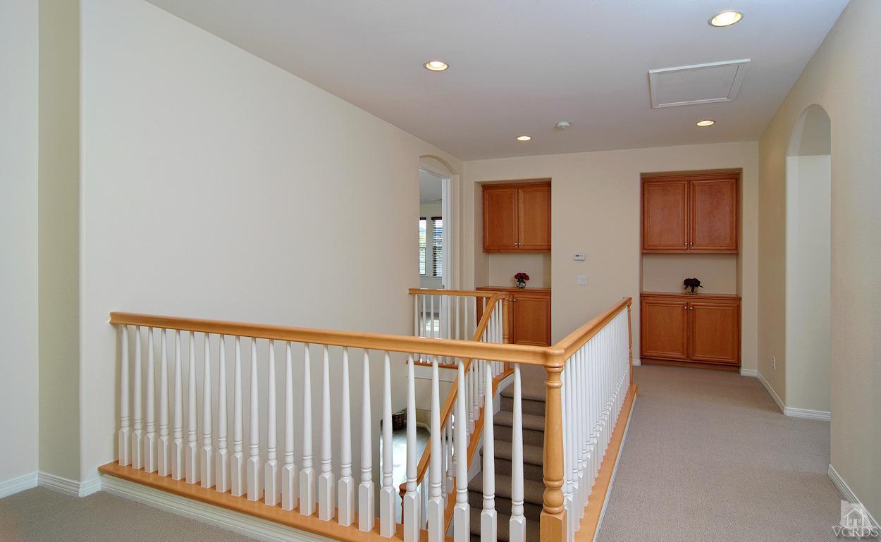 3522 Bridgehampton Way Camarillo, CA 93012 - Photo 33 of 52 a view of a hallway with windows