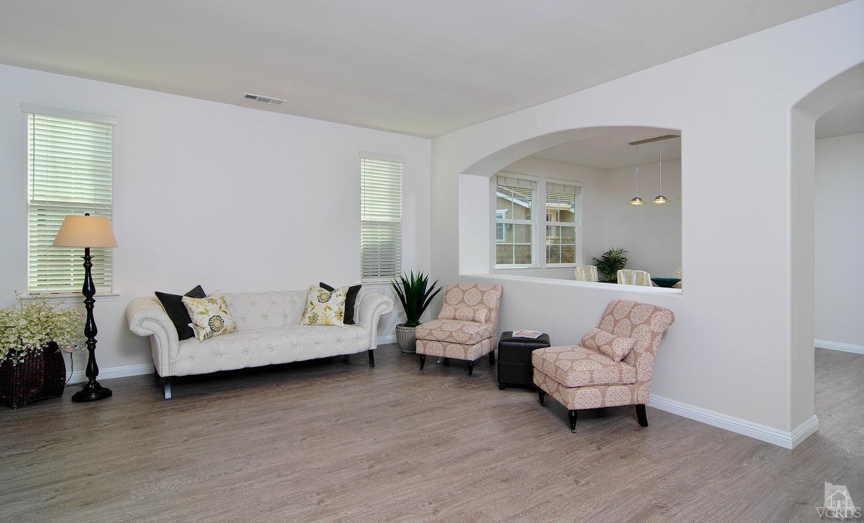 3522 Bridgehampton Way Camarillo, CA 93012 - Photo 5 of 52 a living room with furniture and wooden floor