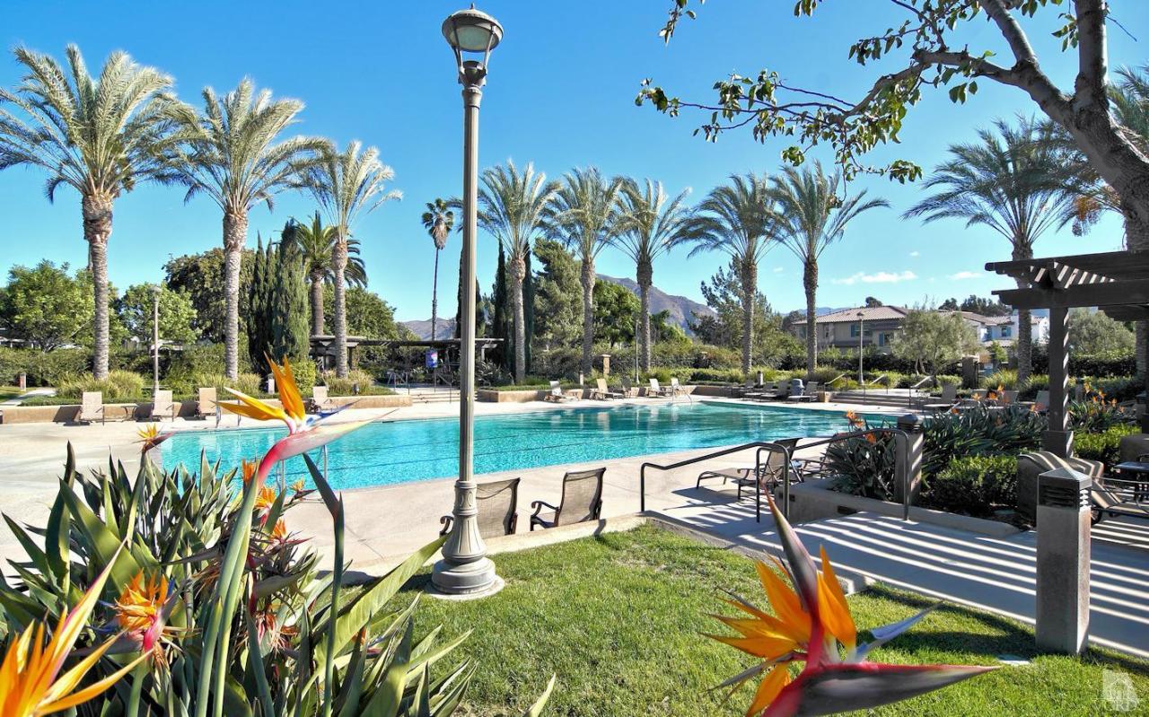 3522 Bridgehampton Way Camarillo, CA 93012 - Photo 41 of 52 a view of a swimming pool with a patio and a garden