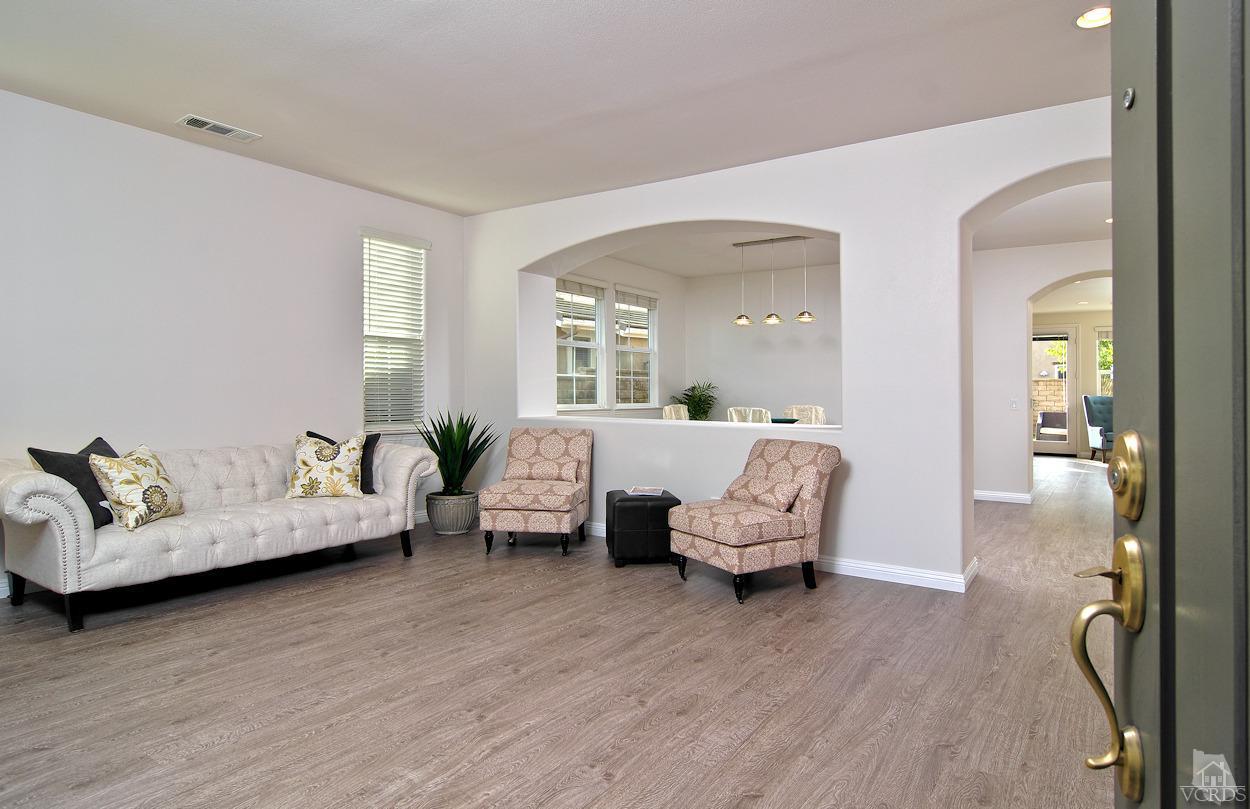 3522 Bridgehampton Way Camarillo, CA 93012 - Photo 6 of 52 a living room with furniture and a wooden floor