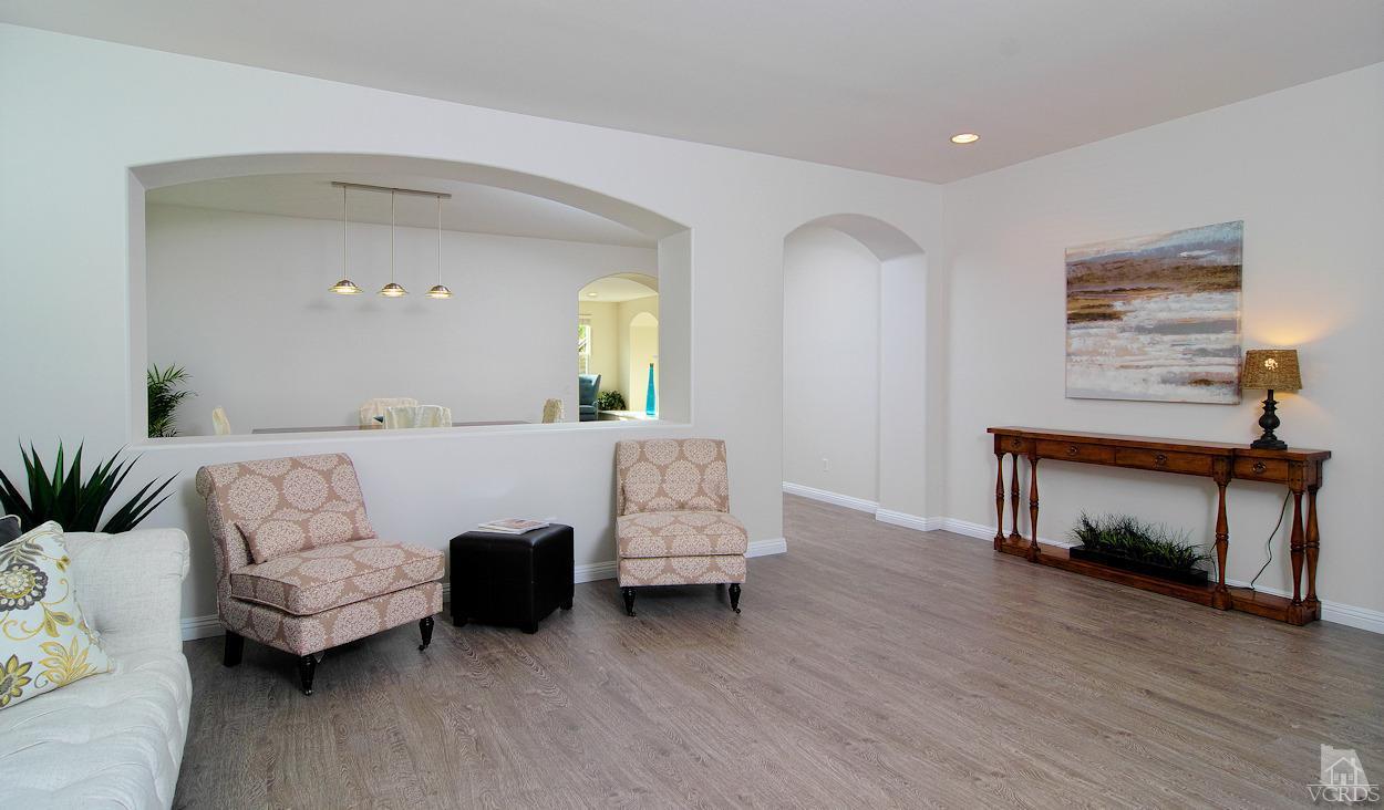 3522 Bridgehampton Way Camarillo, CA 93012 - Photo 7 of 52 a living room with furniture and a wooden floor