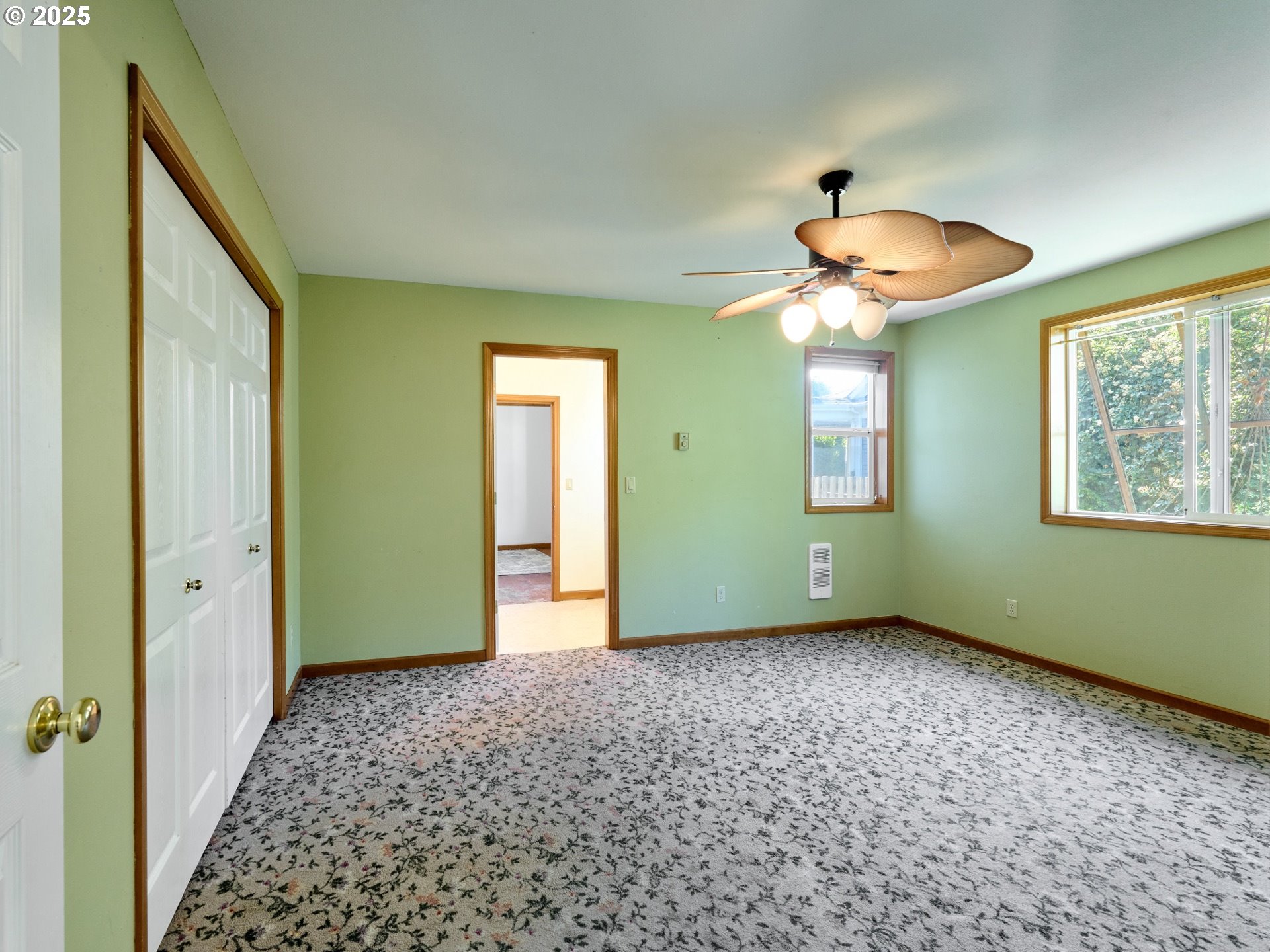 795 Corby Street Woodburn, OR 97071 - Photo 14 of 44 a view of an empty room with a window