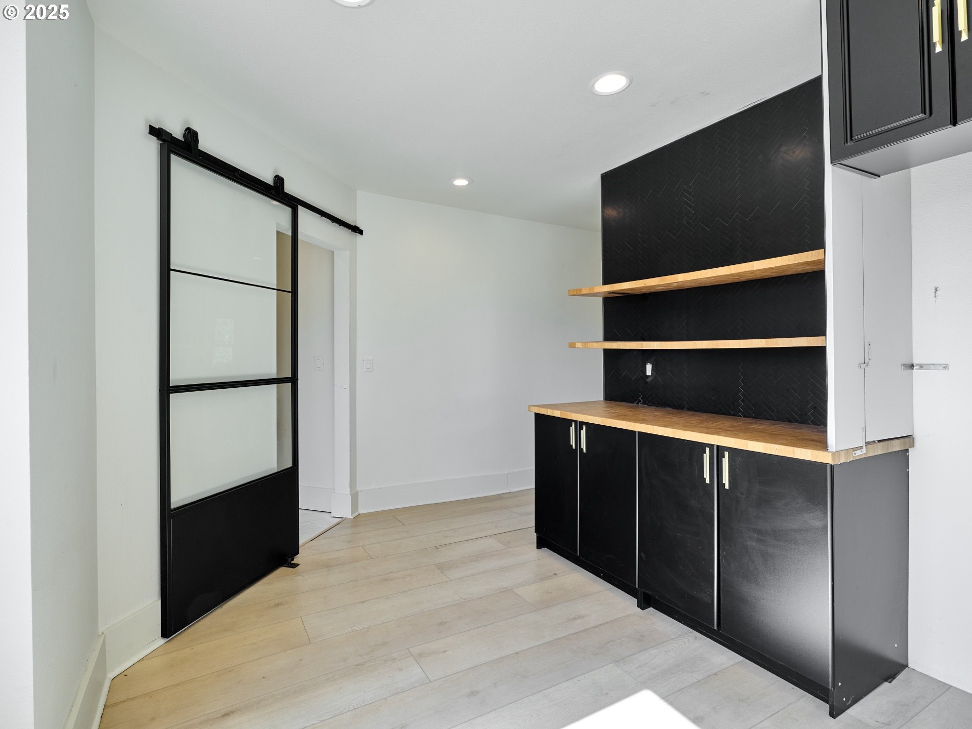 795 Corby Street Woodburn, OR 97071 - Photo 20 of 44 a bedroom with a bed and a flat screen tv