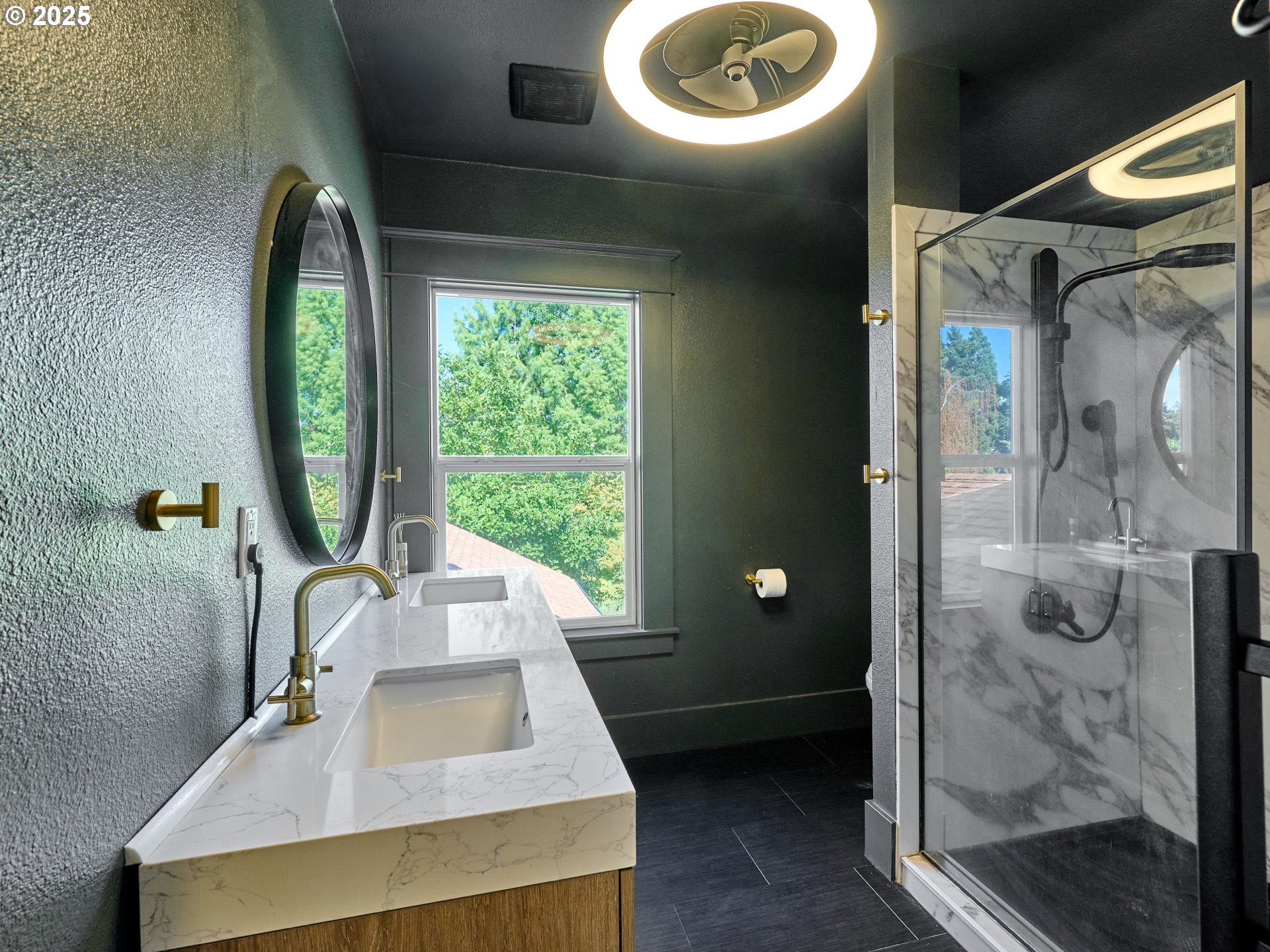 795 Corby Street Woodburn, OR 97071 - Photo 22 of 44 a bathroom with a sink a toilet and shower