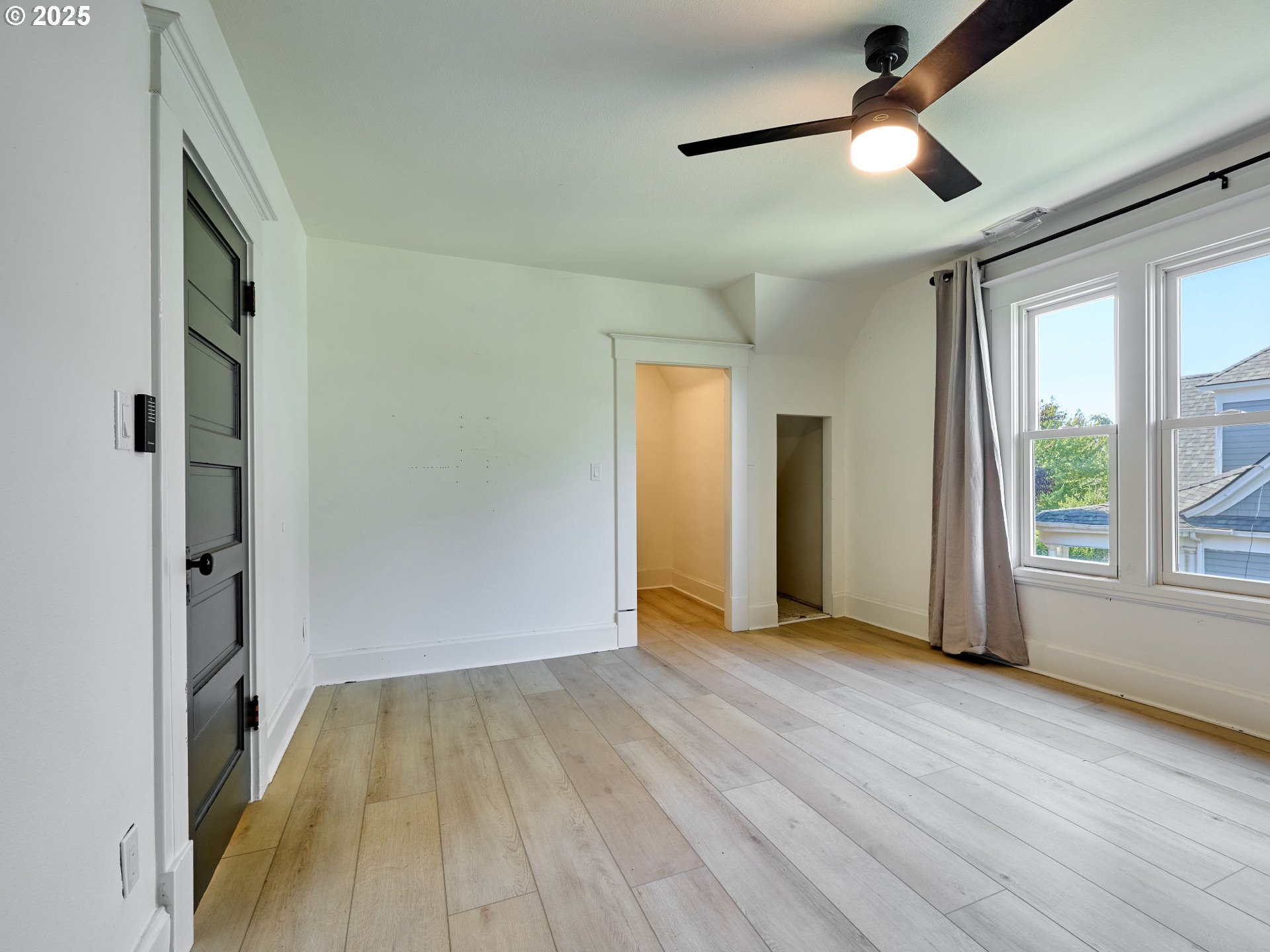 795 Corby Street Woodburn, OR 97071 - Photo 26 of 44 wooden floor in an empty room with a window
