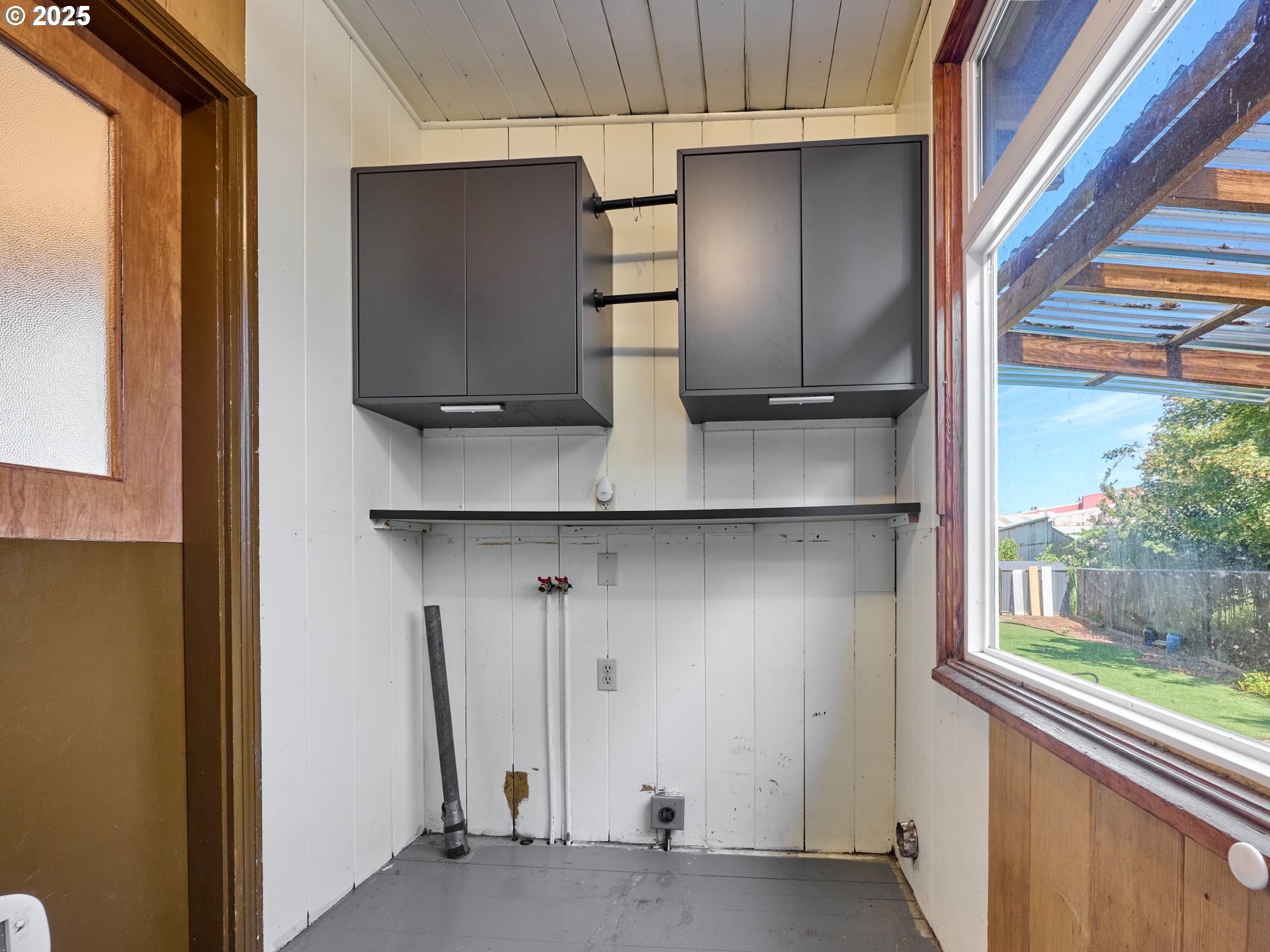 795 Corby Street Woodburn, OR 97071 - Photo 28 of 44 a view of kitchen with a sink and wooden floor