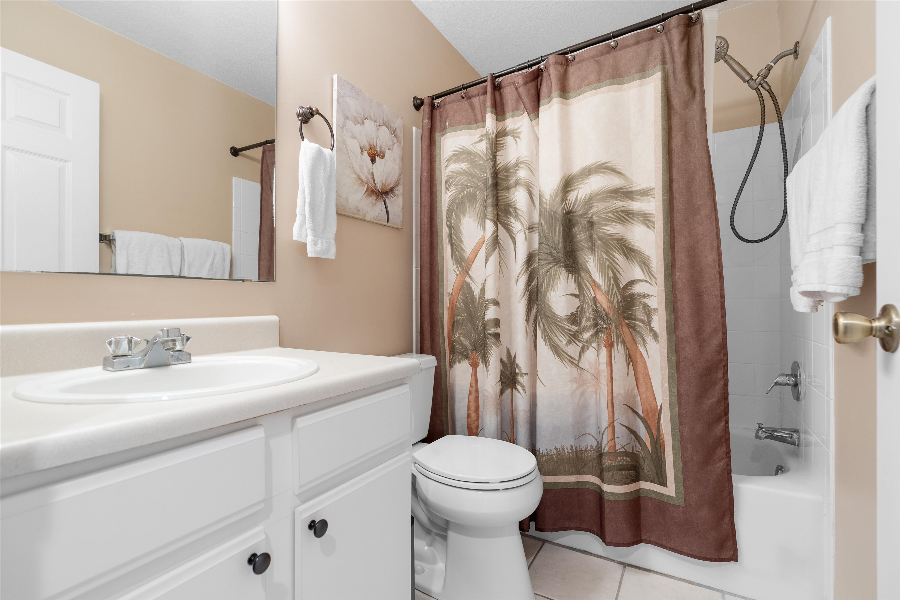 210 16th Street, Unit H St. Augustine, FL 32080 - Photo 23 of 39 a bathroom with a granite countertop sink toilet and shower