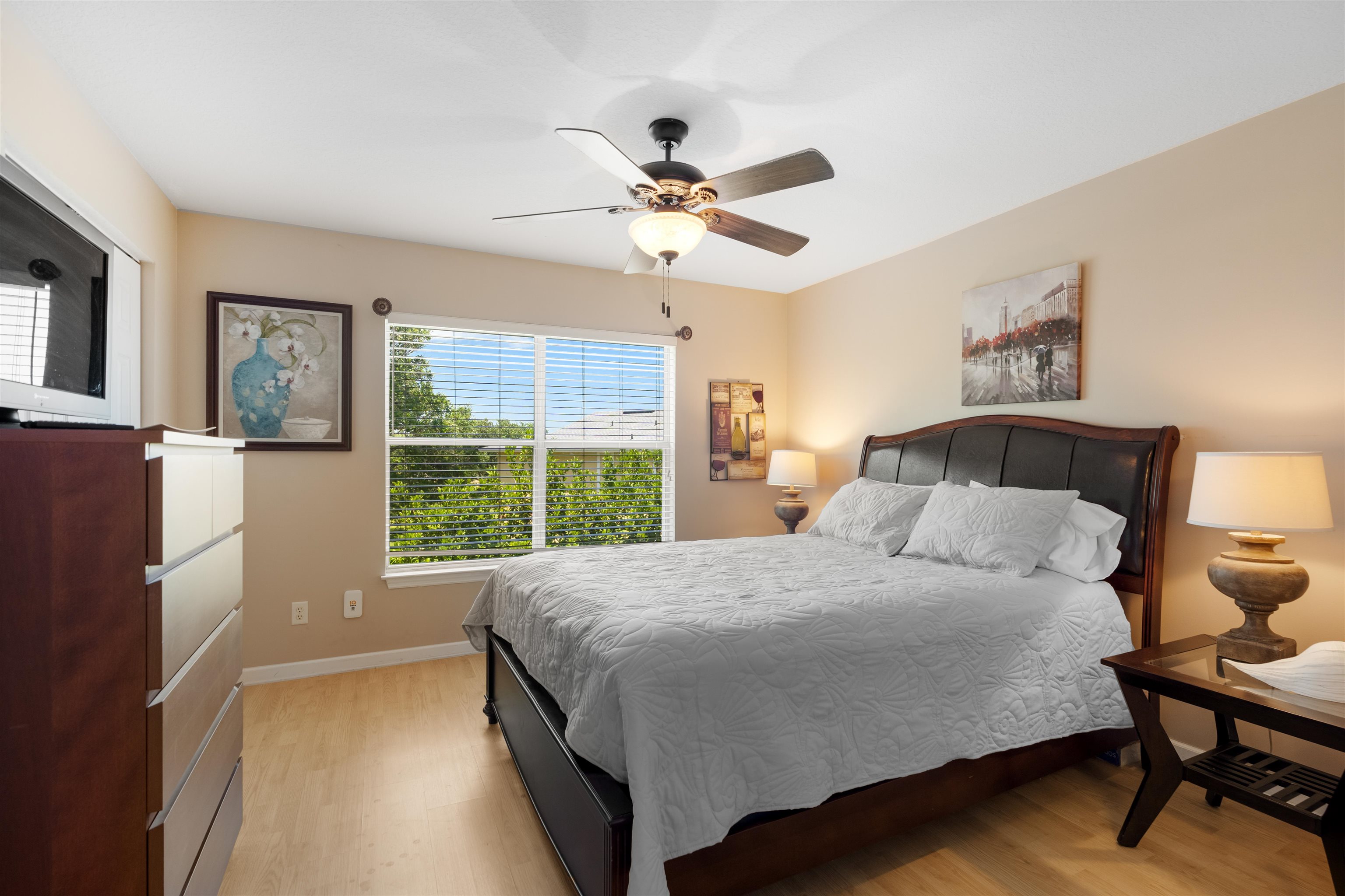 210 16th Street, Unit H St. Augustine, FL 32080 - Photo 35 of 39 a bedroom with a large bed and a window