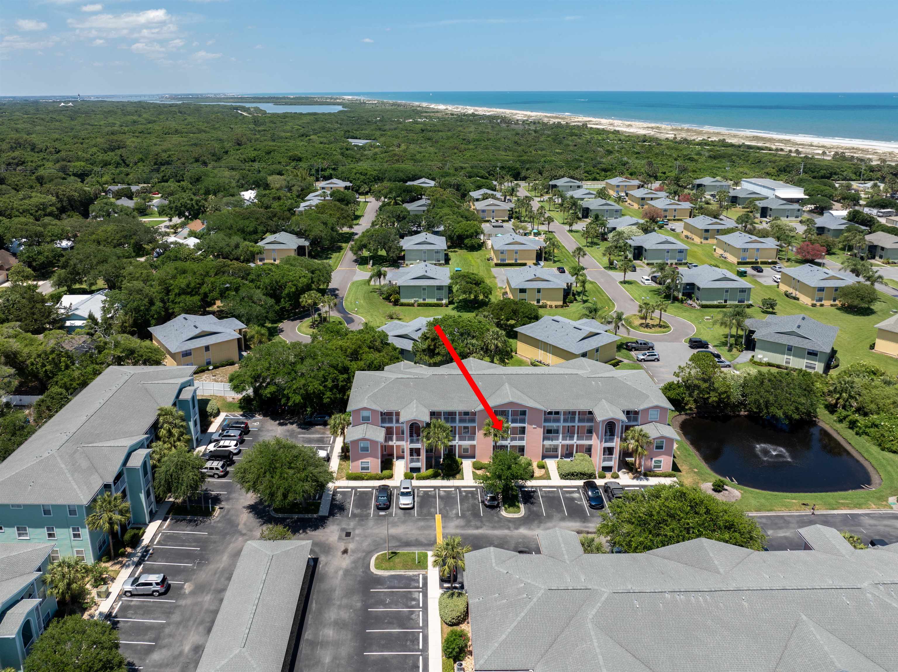 210 16th Street, Unit H St. Augustine, FL 32080 - Photo 8 of 39 an aerial view of a city with lots of residential buildings ocean and mountain view in back