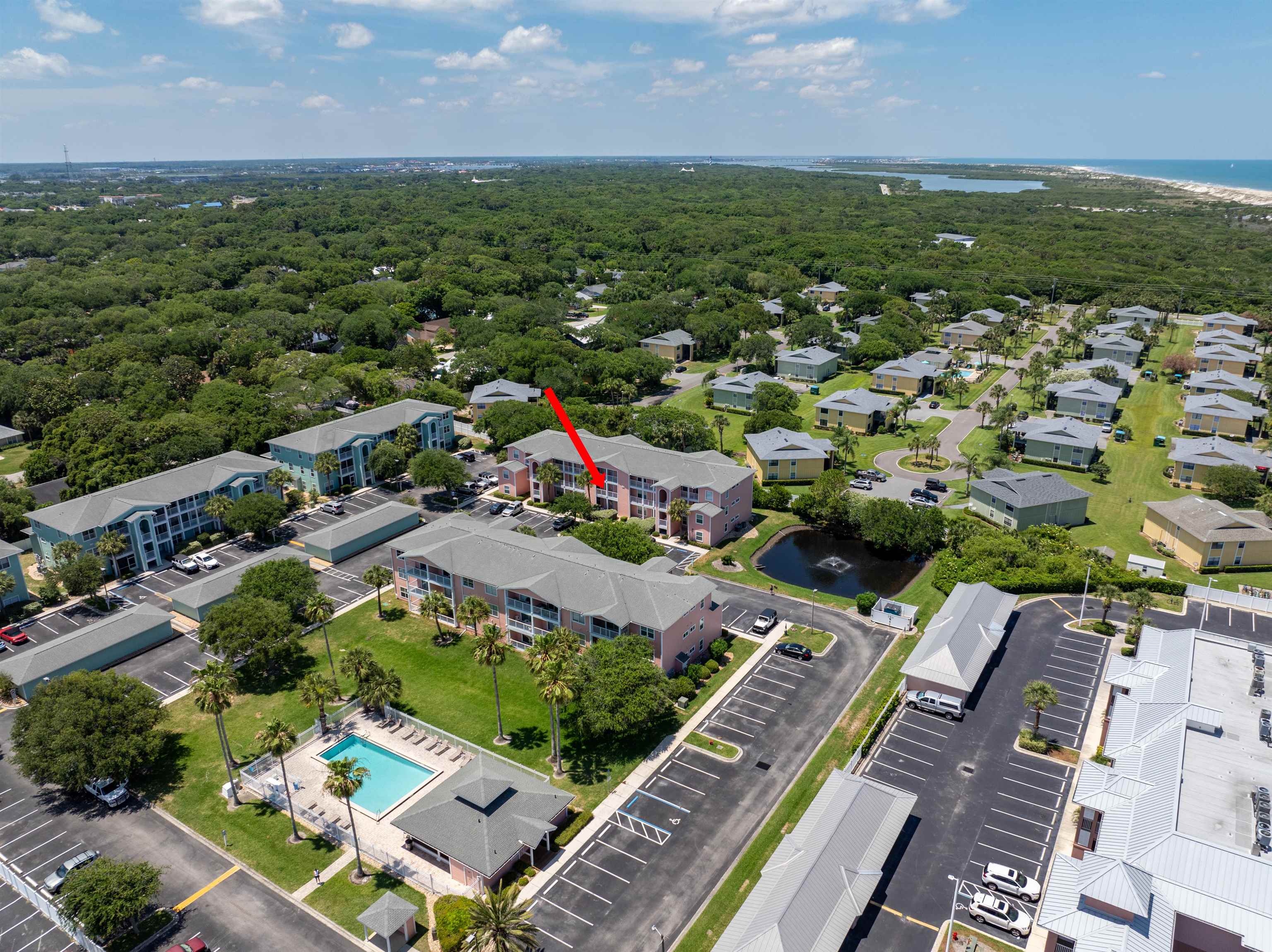 210 16th Street, Unit H St. Augustine, FL 32080 - Photo 9 of 39 an aerial view of residential houses with outdoor space and trees
