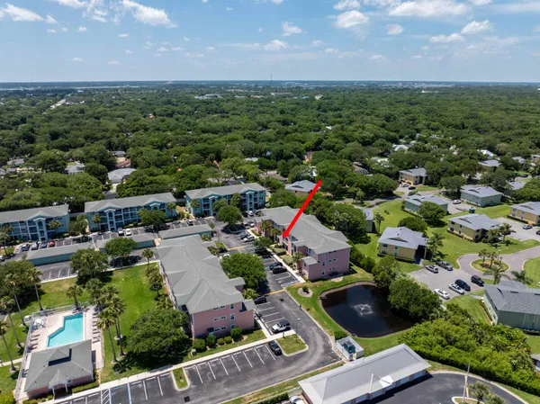 an aerial view of residential houses and outdoor space