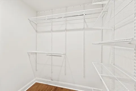 a view of a room with racks on the wall