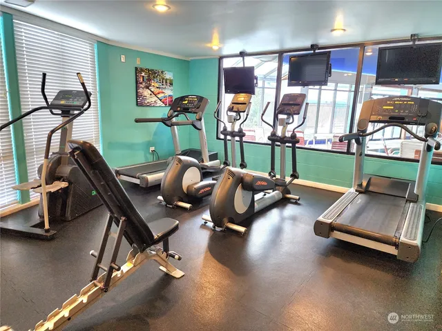 a view of a room with gym equipment