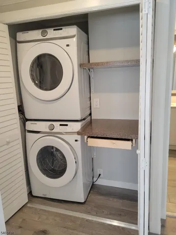 a view of a table and chairs in the balcony