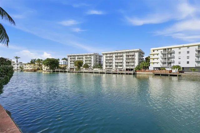 a view of a lake with building in front of it