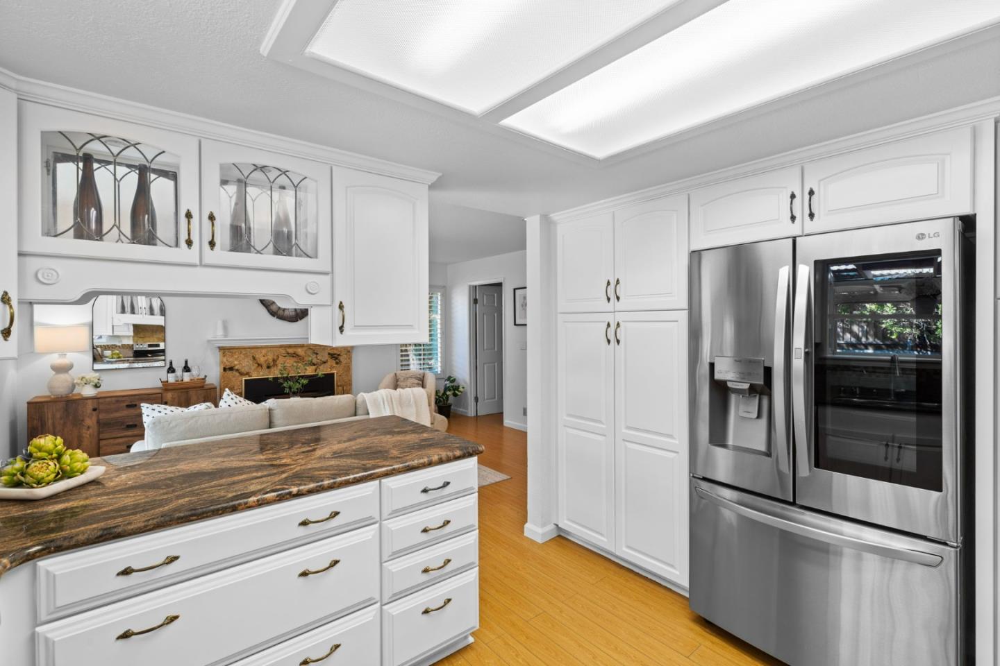 1386 Prada Court Milpitas, CA 95035 - Photo 11 of 36 a kitchen with granite countertop stainless steel appliances a refrigerator and cabinets