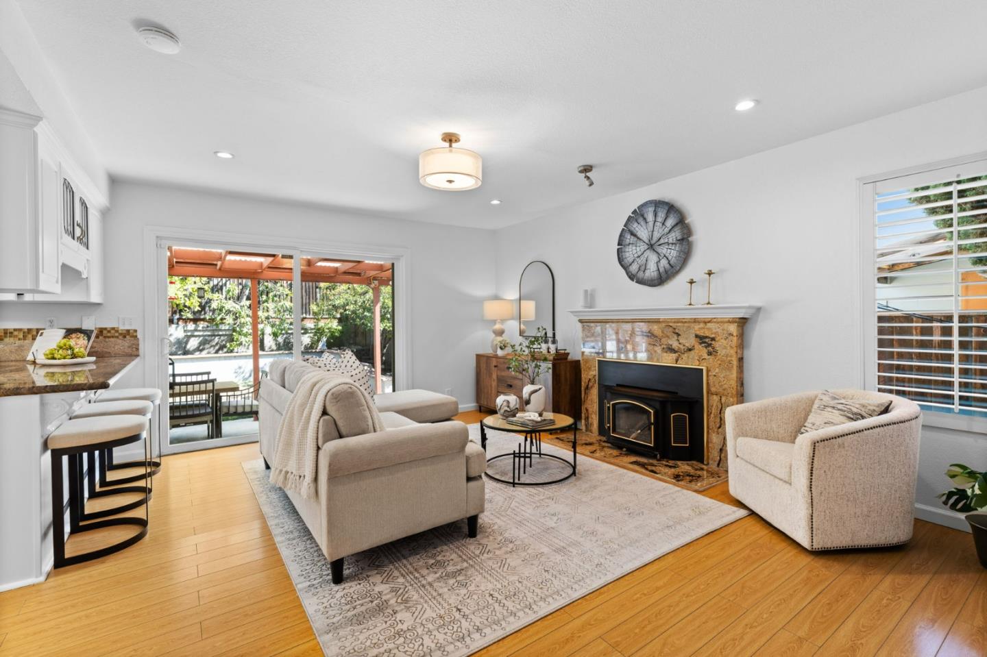 1386 Prada Court Milpitas, CA 95035 - Photo 14 of 36 a living room with furniture and a fireplace