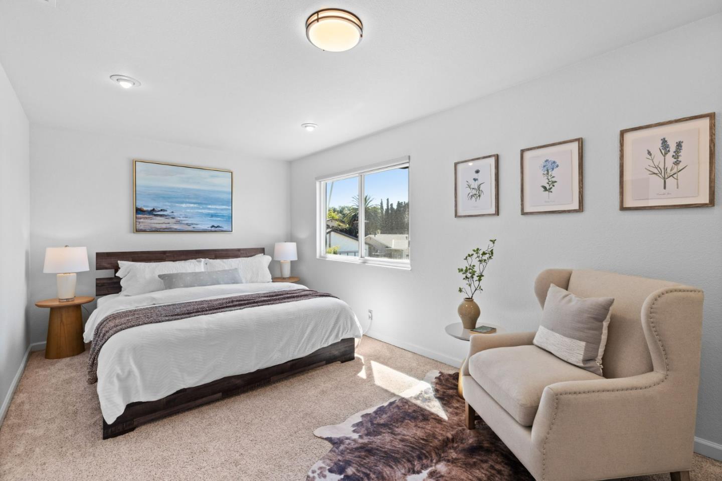 1386 Prada Court Milpitas, CA 95035 - Photo 18 of 36 a spacious bedroom with a bed and a couch