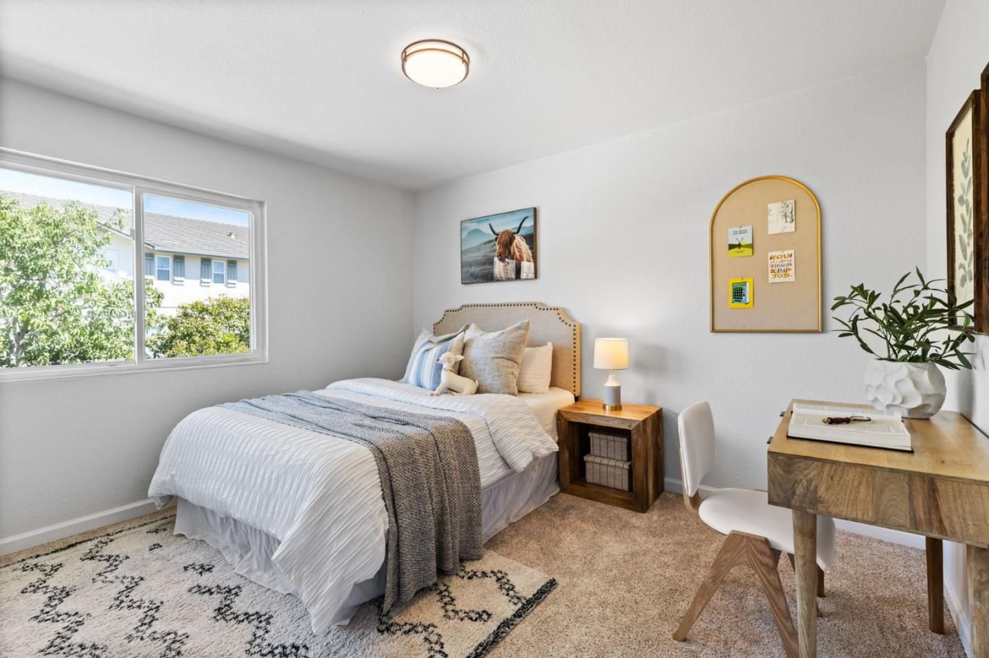 1386 Prada Court Milpitas, CA 95035 - Photo 21 of 36 a bedroom with a bed and a window