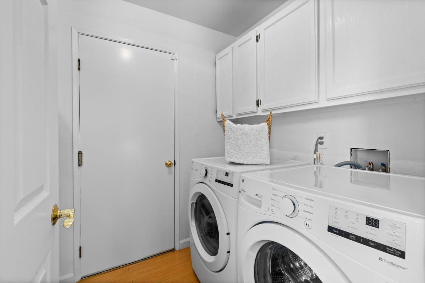 1386 Prada Court Milpitas, CA 95035 - Photo 23 of 36 a utility room with dryer and washer