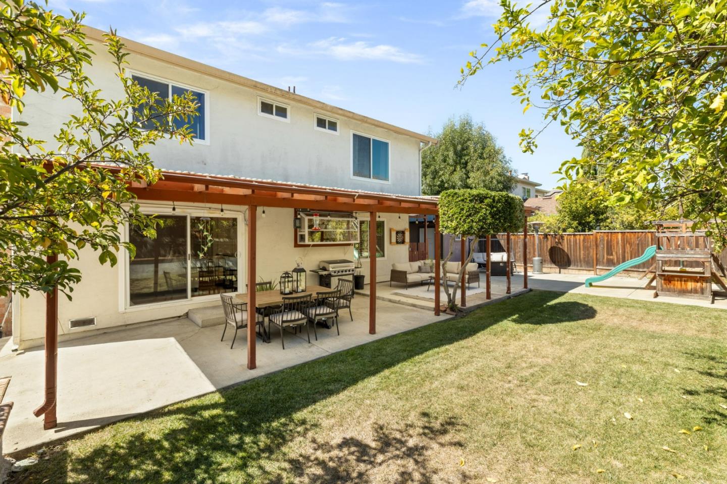 1386 Prada Court Milpitas, CA 95035 - Photo 25 of 36 a view of a house with backyard and sitting area