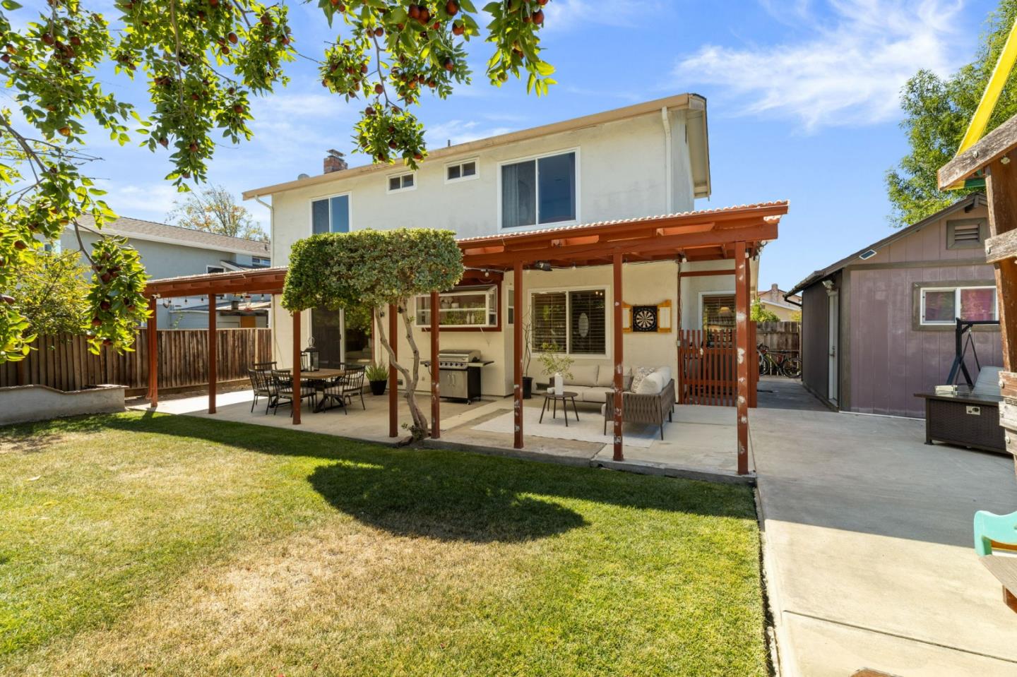 1386 Prada Court Milpitas, CA 95035 - Photo 27 of 36 a view of a house with swimming pool and sitting area