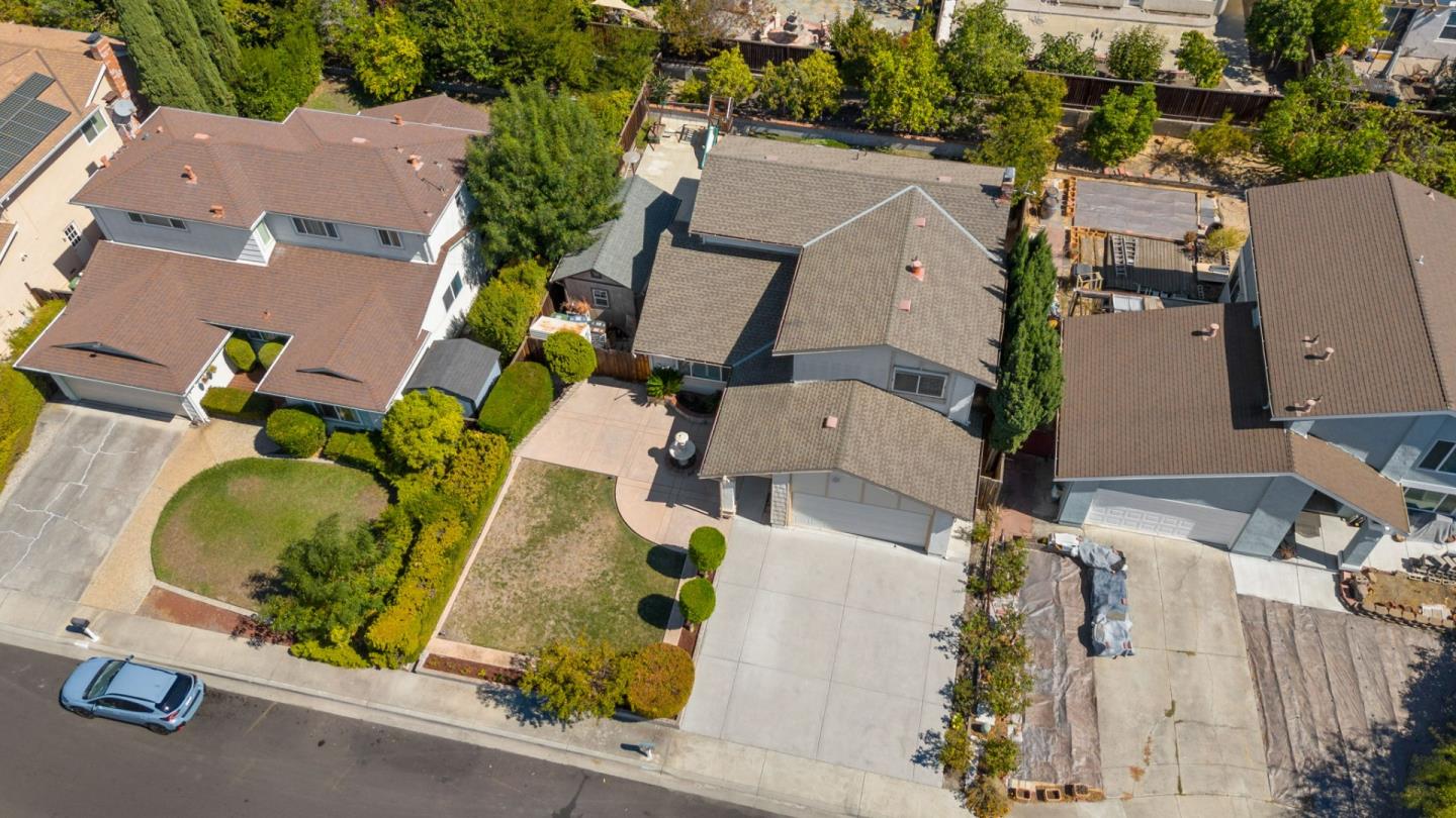 1386 Prada Court Milpitas, CA 95035 - Photo 30 of 36 an aerial view of residential house with outdoor space and parking
