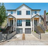 a front view of a house with a porch